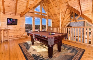 Pigeon forge cabin with game room and theater packages